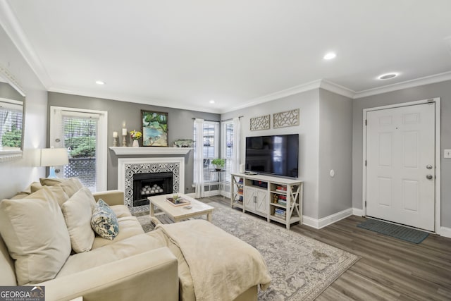 6820 Glenridge Dr Unit C, Sandy Springs, GA 30328 - living room with crown molding, wood finished floors, a tiled fireplace, and recessed lighting