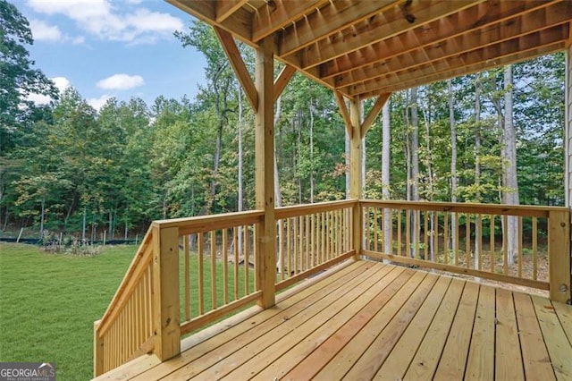 deck featuring a lawn
