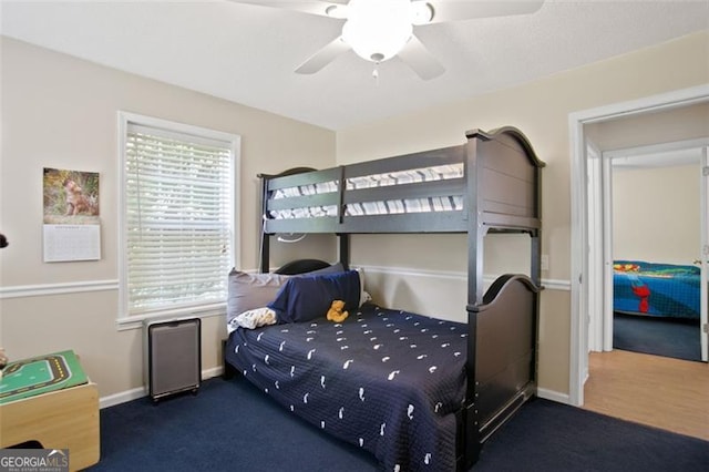 19 Mccrary Ct, Ellijay, GA 30536 - bedroom featuring baseboards, a ceiling fan, and carpet flooring