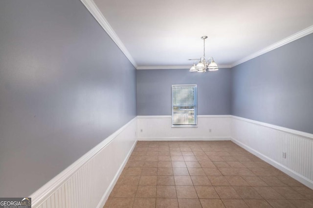 170 Shoal Park Dr, Mcdonough, GA 30252 - tiled spare room with crown molding, a notable chandelier, and a wainscoted wall