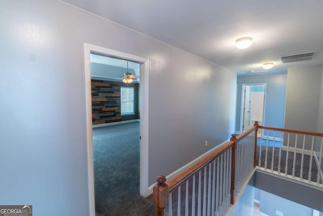 170 Shoal Park Dr, Mcdonough, GA 30252 - hall featuring visible vents, carpet flooring, baseboards, and an upstairs landing