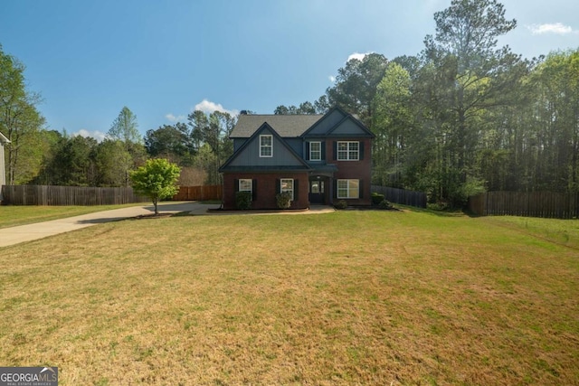 170 Shoal Park Dr, Mcdonough, GA 30252 - view of front facade featuring concrete driveway, a front yard, and fence
