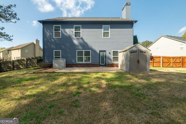 170 Shoal Park Dr, Mcdonough, GA 30252 - rear view of property with a patio area, a fenced backyard, a yard, and a storage unit