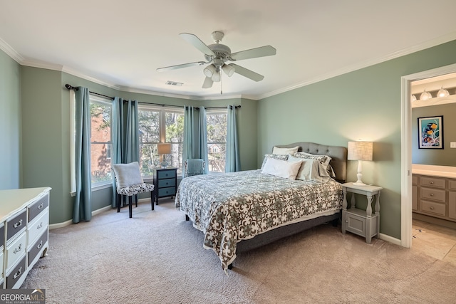 bedroom with baseboards, ornamental molding, visible vents, ceiling fan, and light colored carpet