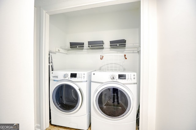 laundry room with laundry area and washer and dryer