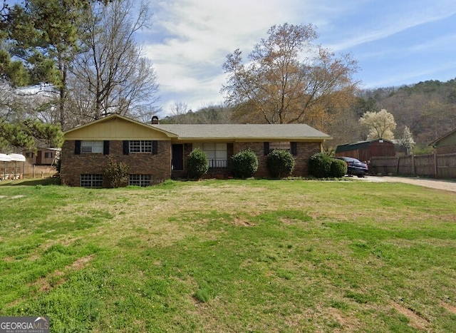 571 Old Lindale Rd SE, Lindale, GA 30147 - single story home with brick siding and a chimney