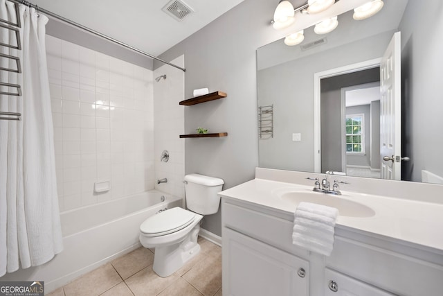 bathroom with visible vents, toilet, shower / bath combo with shower curtain, and tile patterned floors