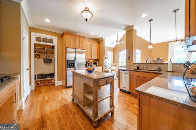 20 Rivercreek Xing, Kingston, GA 30145 - kitchen with stainless steel appliances, a ceiling fan, ornamental molding, decorative backsplash, and light wood-style floors