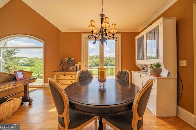 20 Rivercreek Xing, Kingston, GA 30145 - dining space with a chandelier, plenty of natural light, light wood-type flooring, and ornamental molding