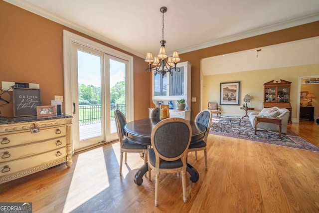 20 Rivercreek Xing, Kingston, GA 30145 - dining space with a chandelier, light wood-type flooring, and ornamental molding