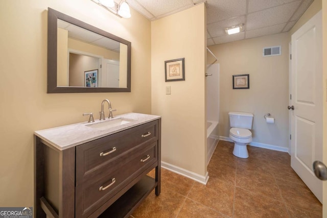 full bathroom with vanity, a paneled ceiling, toilet, visible vents, and shower / bathing tub combination