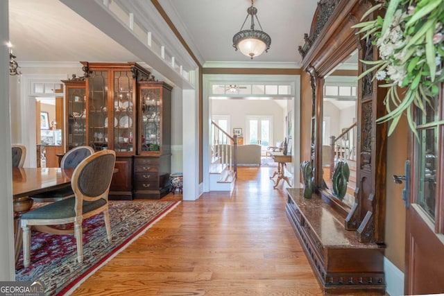 20 Rivercreek Xing, Kingston, GA 30145 - entrance foyer featuring stairs, light wood-style flooring, and ornamental molding