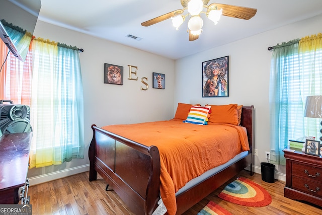 1 Graben Dr NW, Rome, GA 30165 - bedroom with visible vents, baseboards, ceiling fan, and wood finished floors