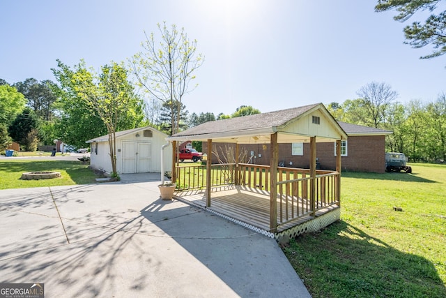 1 Graben Dr NW, Rome, GA 30165 - exterior space with a storage shed, a front yard, and an outdoor structure