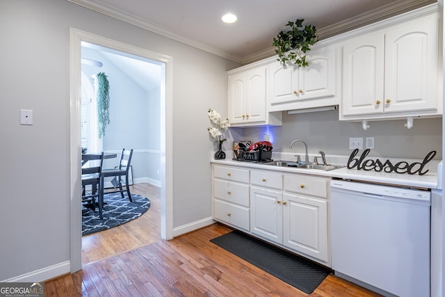 1 Graben Dr NW, Rome, GA 30165 - kitchen featuring white cabinets, dishwasher, a sink, ornamental molding, and light wood-style flooring