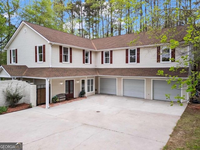 2455 Horseleg Creek Rd SW, Rome, GA 30165 - view of front of property with a garage, driveway, fence, and a shingled roof