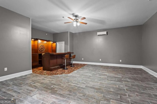 2455 Horseleg Creek Rd SW, Rome, GA 30165 - interior space with baseboards, an AC wall unit, and a ceiling fan