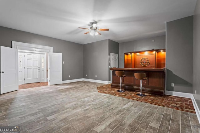 2455 Horseleg Creek Rd SW, Rome, GA 30165 - living room featuring baseboards, a ceiling fan, and wood finished floors