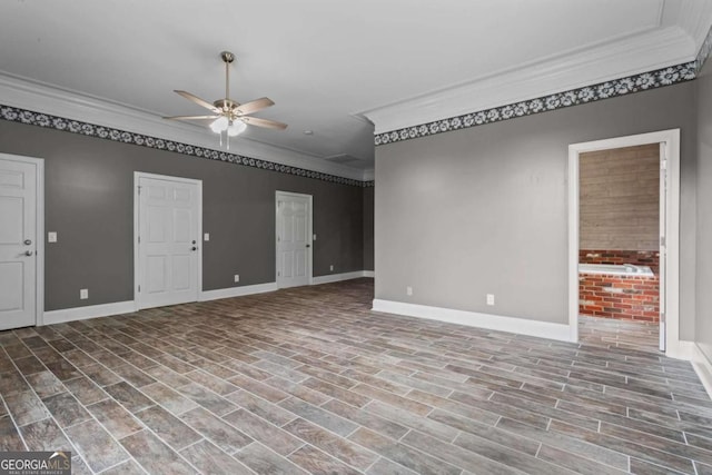 2455 Horseleg Creek Rd SW, Rome, GA 30165 - unfurnished living room with wood finished floors, ceiling fan, baseboards, and ornamental molding