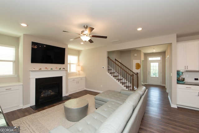 3495 Delegate Aly, Scottdale, GA 30079 - living room featuring baseboards, a ceiling fan, dark wood-style floors, and stairway