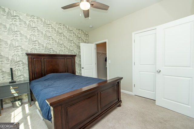 3495 Delegate Aly, Scottdale, GA 30079 - bedroom featuring wallpapered walls, a ceiling fan, baseboards, and light carpet