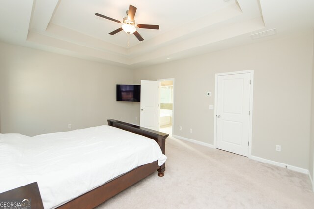 3495 Delegate Aly, Scottdale, GA 30079 - bedroom with baseboards, ensuite bath, light colored carpet, and a raised ceiling