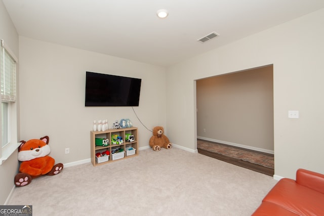 3495 Delegate Aly, Scottdale, GA 30079 - recreation room with carpet, visible vents, and baseboards