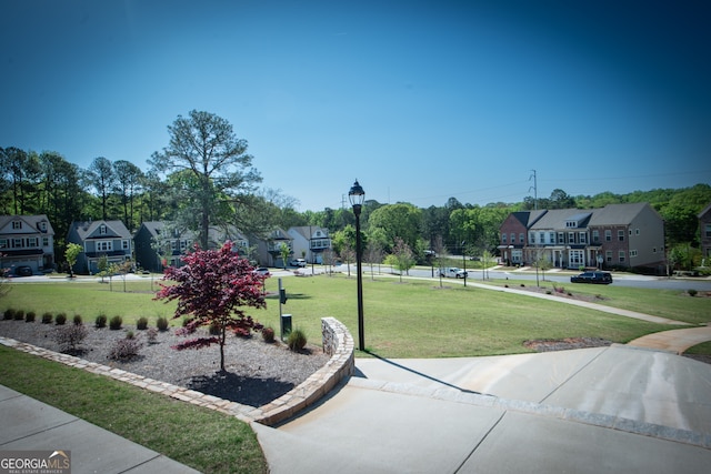 3495 Delegate Aly, Scottdale, GA 30079 - view of community featuring a yard and a residential view