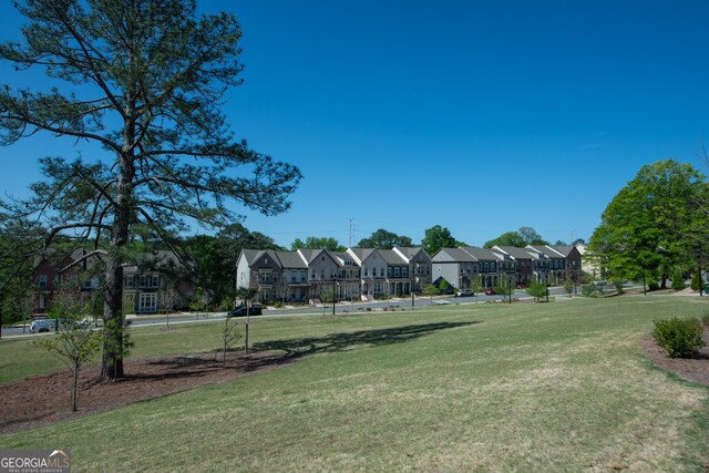 3495 Delegate Aly, Scottdale, GA 30079 - view of property's community with a residential view and a lawn
