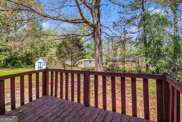 3742 Linecrest Rd, Ellenwood, GA 30294 - wooden deck featuring an outbuilding and a shed