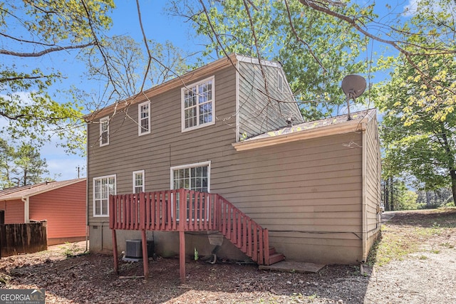 3742 Linecrest Rd, Ellenwood, GA 30294 - rear view of property with central AC unit and a wooden deck