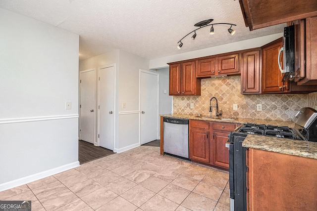 3742 Linecrest Rd, Ellenwood, GA 30294 - kitchen with stainless steel appliances, a sink, backsplash, and light stone counters