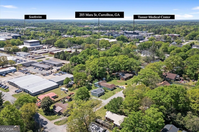 drone / aerial view with a view of trees