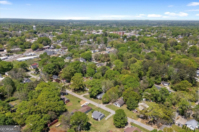 drone / aerial view with a forest view