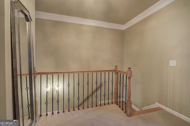 stairs with crown molding, baseboards, and carpet floors