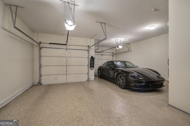 garage featuring a garage door opener