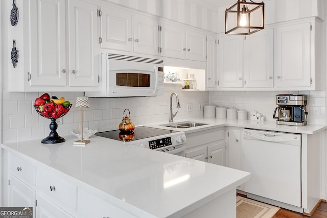 1826 Bedfordshire Ct, Decatur, GA 30033 - kitchen with white appliances, a sink, and white cabinets