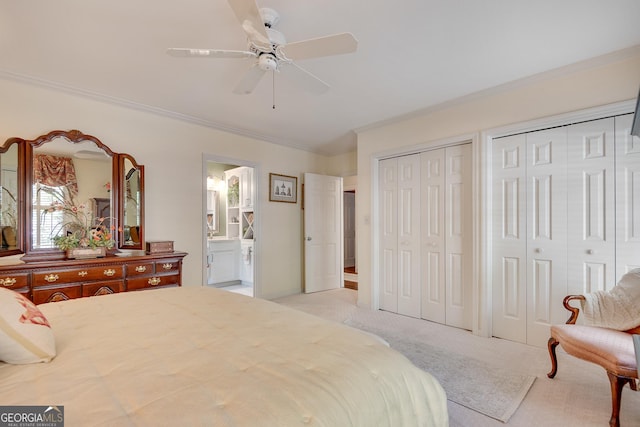 1826 Bedfordshire Ct, Decatur, GA 30033 - bedroom featuring two closets, light carpet, crown molding, ceiling fan, and connected bathroom