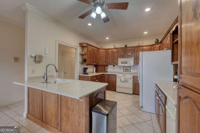 kitchen with open shelves, white appliances, a sink, a peninsula, and crown molding