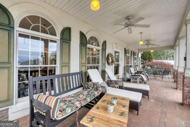 view of patio featuring a porch and a ceiling fan
