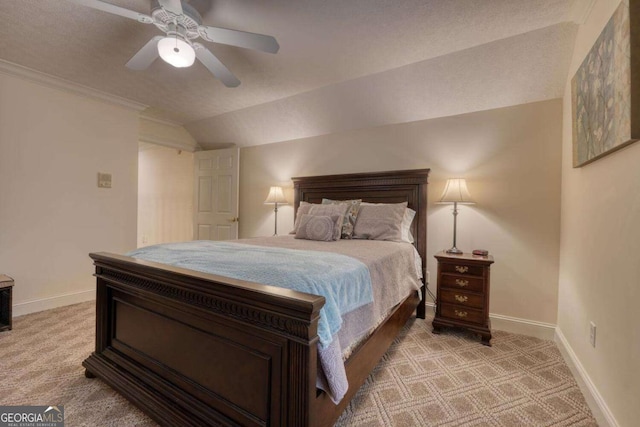 bedroom featuring light carpet, vaulted ceiling, baseboards, and a ceiling fan