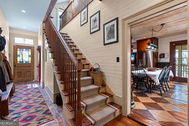 218 Barry St, Decatur, GA 30030 - staircase with wood walls and recessed lighting