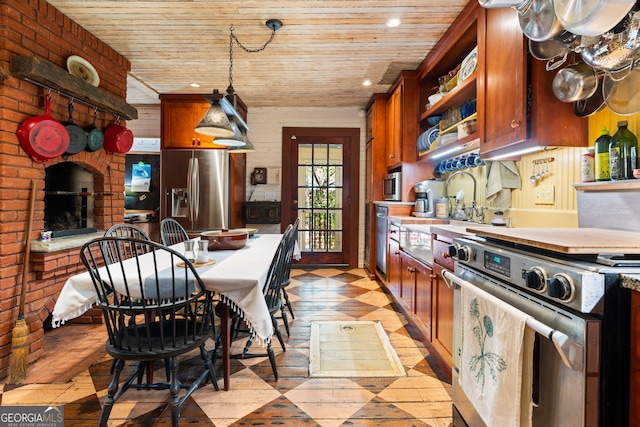 218 Barry St, Decatur, GA 30030 - dining room with a brick fireplace, recessed lighting, light floors, and wood ceiling