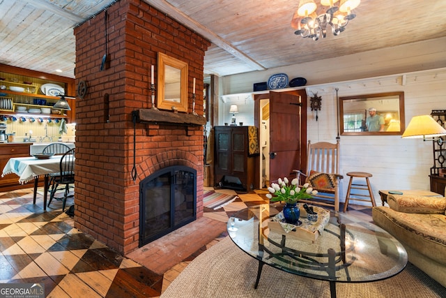 218 Barry St, Decatur, GA 30030 - living area featuring wood ceiling, wooden walls, a notable chandelier, and a brick fireplace