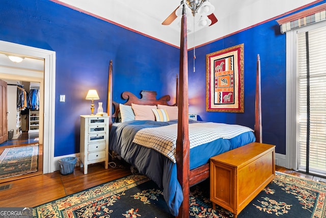 218 Barry St, Decatur, GA 30030 - bedroom with wood finished floors, baseboards, a ceiling fan, and visible vents