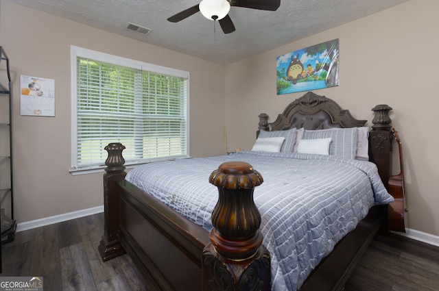 101 Javay Ct, Villa Rica, GA 30180 - bedroom with wood finished floors, a textured ceiling, and a ceiling fan