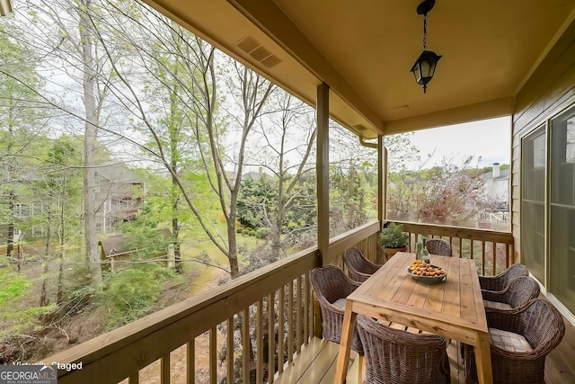 exterior space with outdoor dining space
