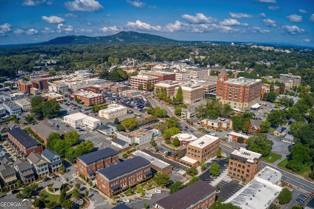 bird's eye view featuring a view of city and a mountain view