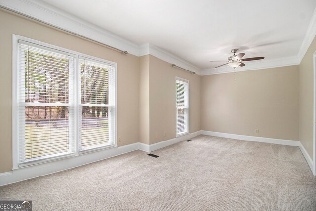 110 Kylemore Pass, Tyrone, GA 30290 - empty room featuring a ceiling fan, ornamental molding, light carpet, and baseboards