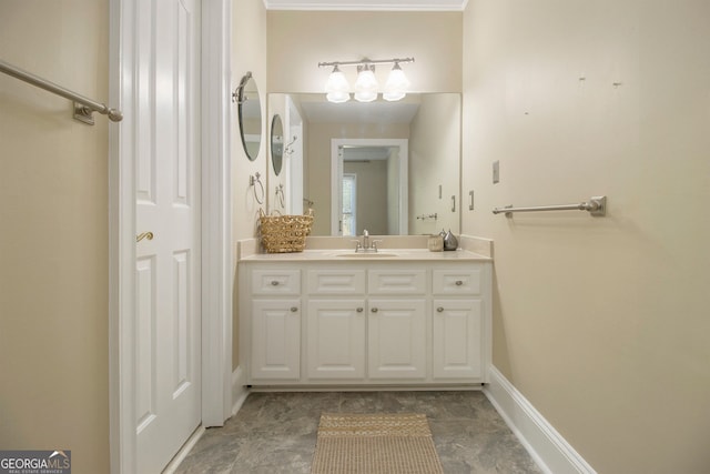 bathroom with vanity and baseboards